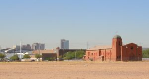 The former Sacred Heart Catholic temple was the only structure that was not demolished when the Golden Gate barrio disappeared. The Mexican-American neighborhood was razed to make room for the expansion of the Sky Harbor International Airport and the Sky Harbor Center. The empty building was added to the Historic Property Register in 2007. Photo by Eduardo Barraza | Barriozona Magazine © 2004