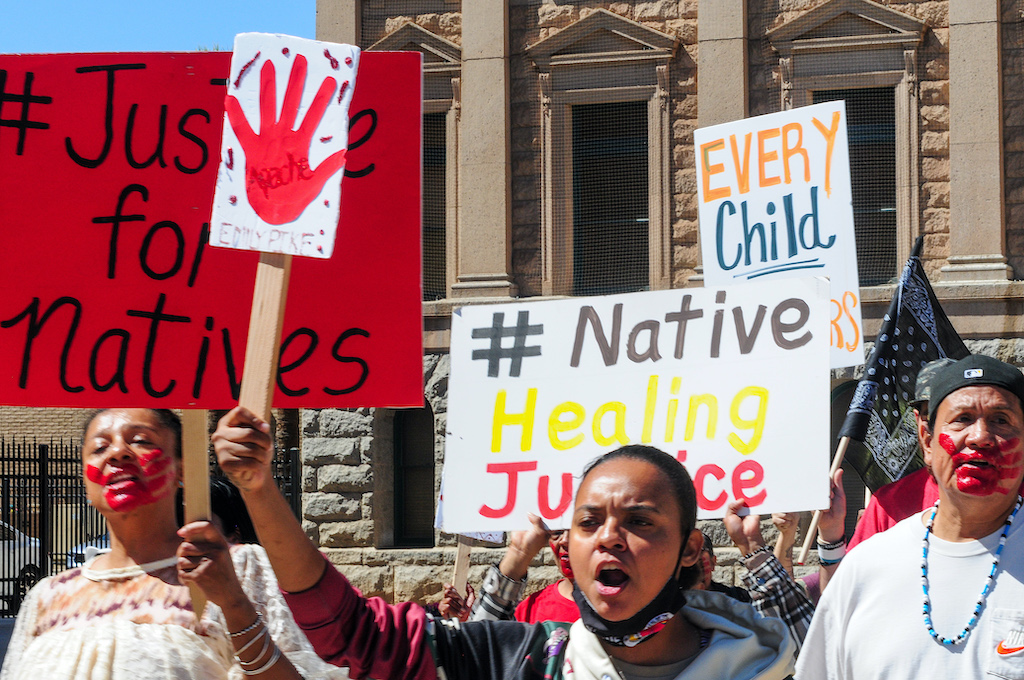 Protesters march outside the Arizona State Capitol, demanding justice in the Emily Pike case and highlighting Arizona’s crisis of missing and murdered Indigenous people. Pike’s remains were found last month in Gila County, and the search for her killer continues. Demonstrators urge lawmakers to pass HB 2281, which would create an Amber Alert-style system for missing Indigenous individuals. Photo: Eduardo Barraza | Barriozona Magazine © 2025